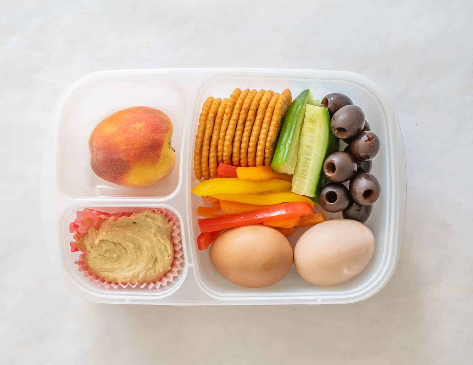 Quick and easy school and adult lunch box ideas made with Sabra Hummus, fruit, vegetables, and more. 
