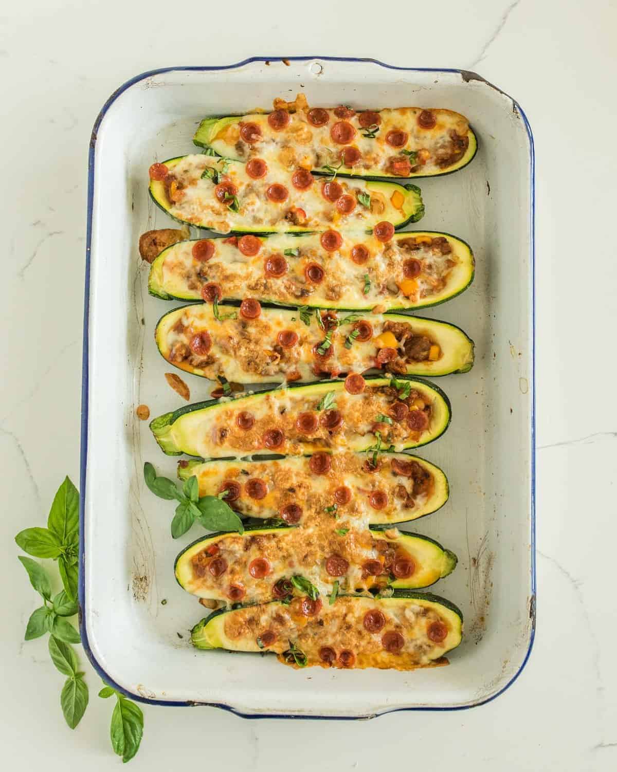 All the flavors of a supreme pizza turned into a stuffed zucchini, made with sausage, pepperoni, peppers, onions, cheese, and more. Done in less than 30 minutes.