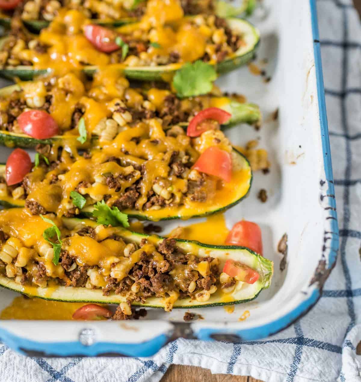 Quick and easy taco zucchini boats made with a simple taco meat and corn mixture, cheese, and zucchini and all done in about 30 minutes.