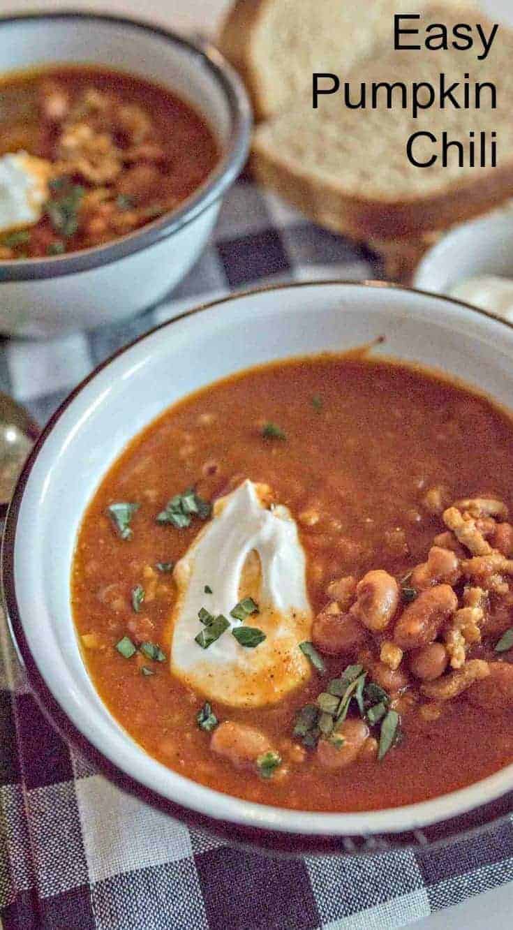A favorite chili recipe! Quick, easy & healthy turkey pumpkin chili made with ground turkey, canned tomatoes, pumpkin puree, beans & lots of hearty spices. #chili #pumpkin #cozymeals #dinner