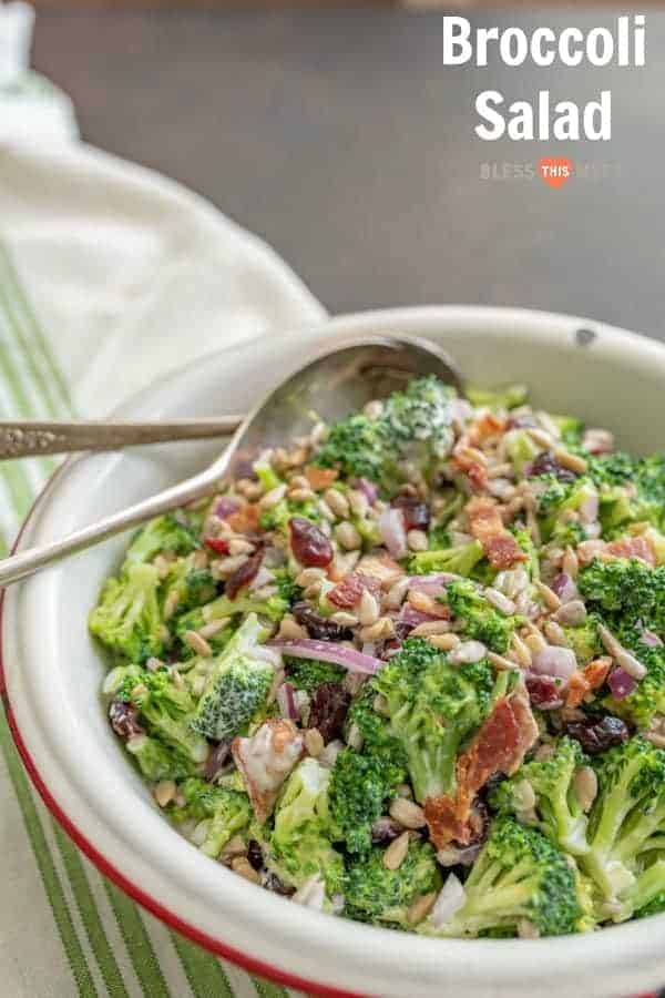 Deli-Style broccoli salad made with all your favorites like bacon, onion, cranberries, and more, plus a secret tip! 