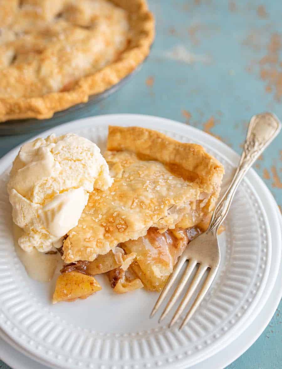 This buttery and flaky all butter pie crust is such a simple recipe with just 4 ingredients, and the perfect crust for all your favorite pies! Get you homemade pie baking on with this super simple, super perfect pie crust made without any shortening as the fat -- just butter! #butterpiecrust #piecrust #piecrustrecipe #pie #pierecipe #allbutterpiecrust #holidaybaking #pies