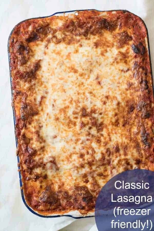 Classic lasagna recipe made with traditional ingredients like sausage, homemade sauce, and loads of cheese. Plus it's freezer friendly too.