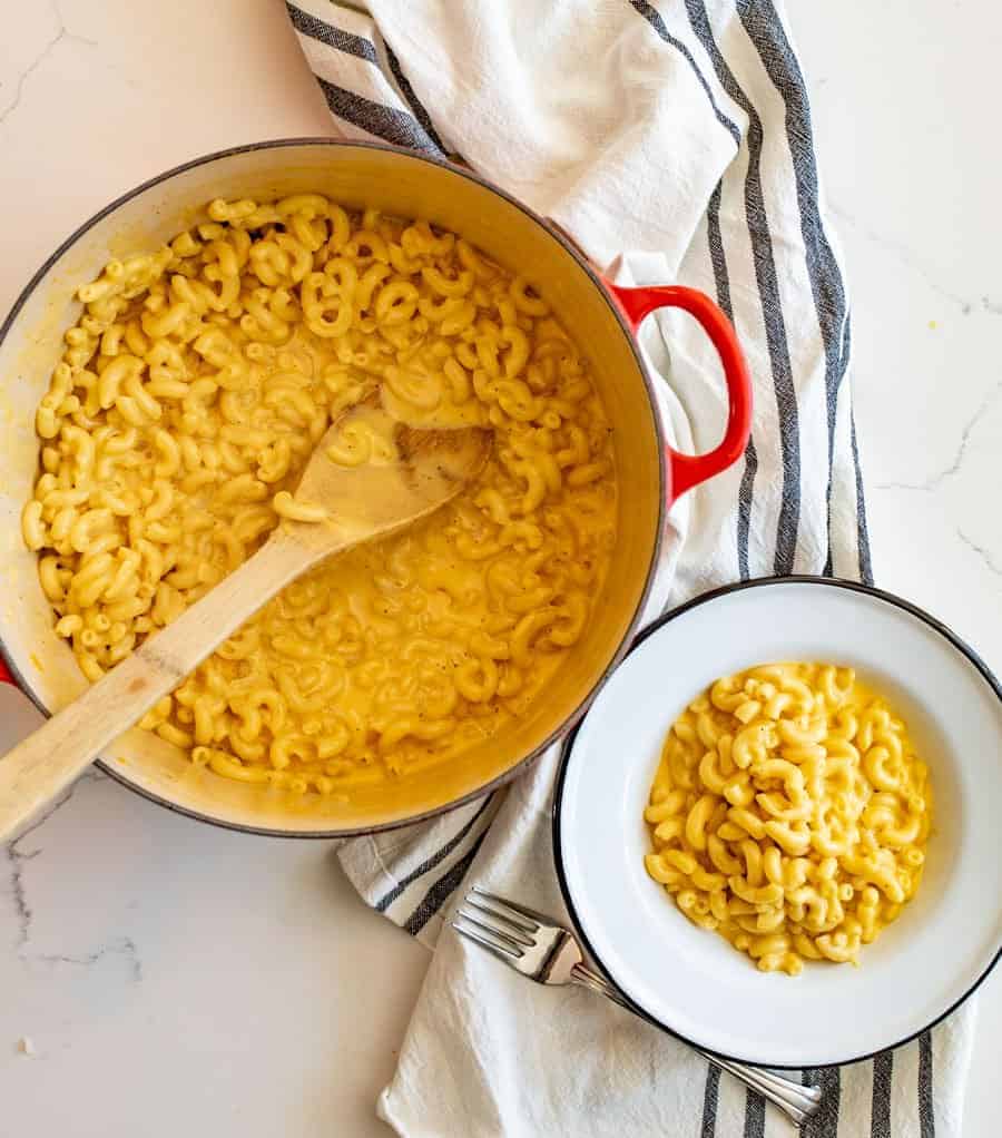 Homemade mac and cheese made in one pot on the stove top with just a few simple ingredients like evaporated milk, eggs, and cheese.