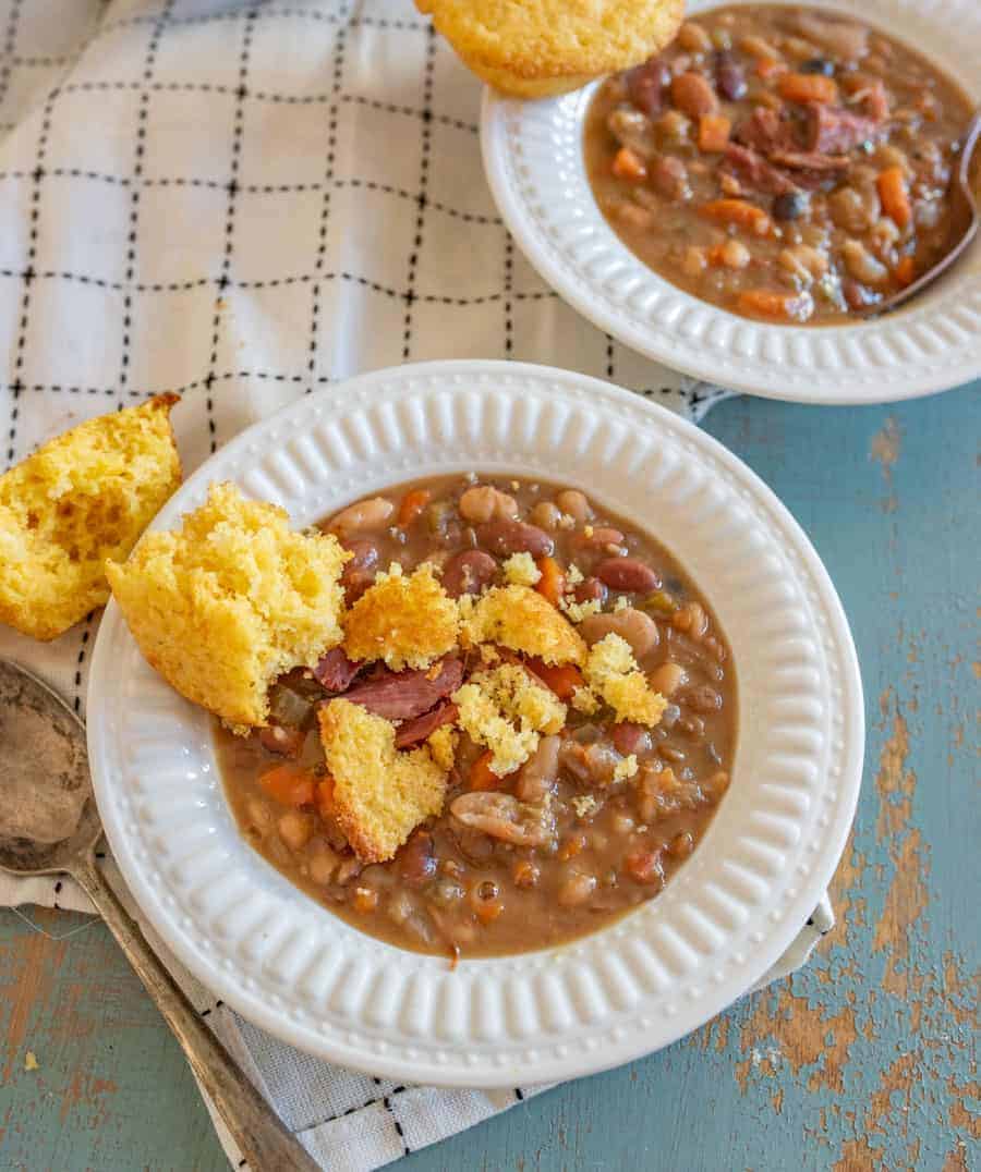 Hearty "15 Bean Soup" in the Instant Pot made with ham, broth, veggies & my favorite Hurst's dried beans. A perfect soup to serve with a side of cornbread! #15beansoup #hamandbeans #beans #instantpot