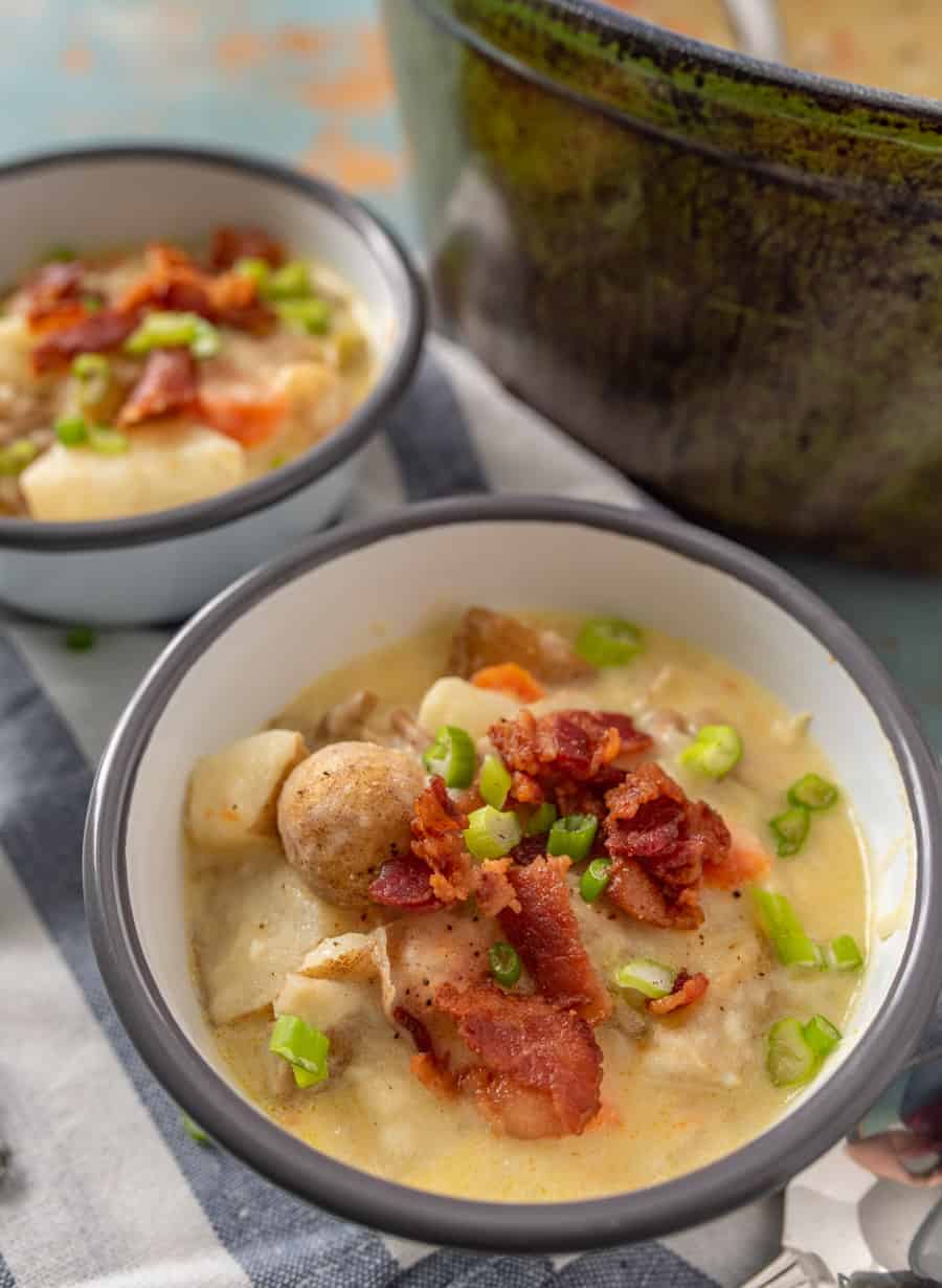 Classic creamy potato chowder with bacon, lots of veggies, potatoes, and made creamy with the addition of sour cream.