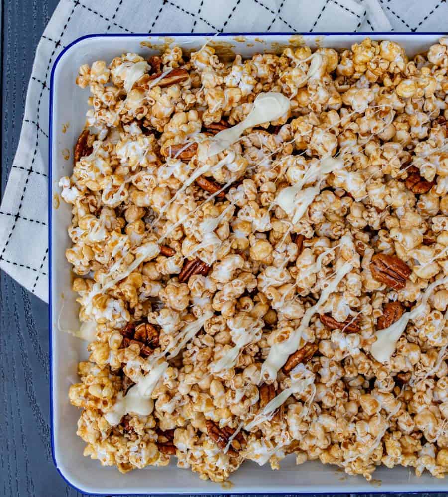 Carmel corn drizzled with white chocolate and with added pecans.