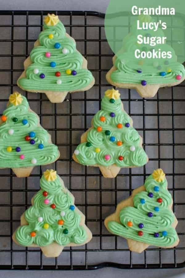 Title Image for Grandma Lucy's Sugar Cookies and a cooling rack with sugar cookies decorated as Christmas trees