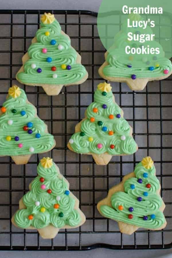 Title Image for Grandma Lucy's Sugar Cookies and a cooling rack with sugar cookies decorated as Christmas trees