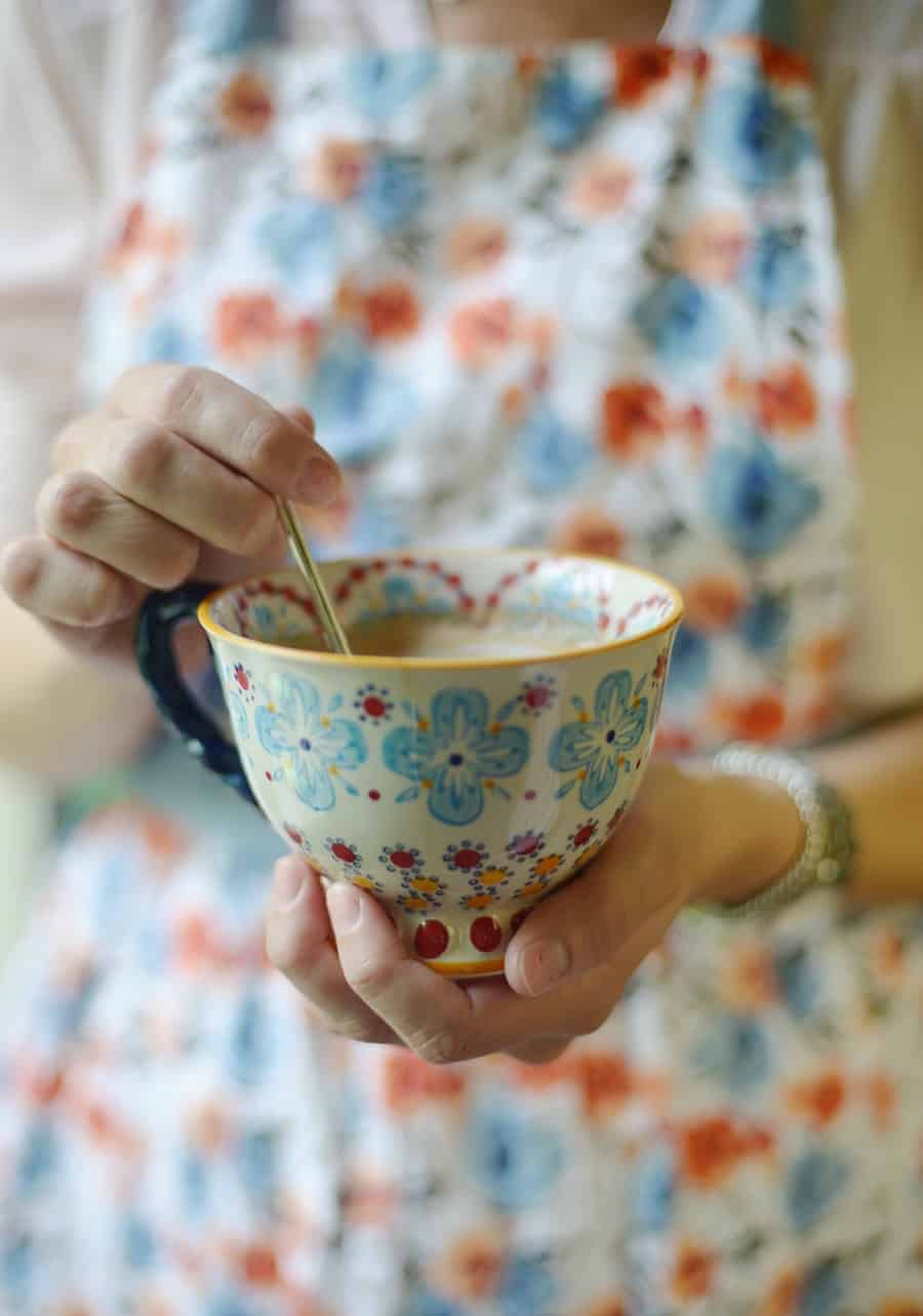 Natural remedies for anxiety including herbal chamomile tea in floral mug