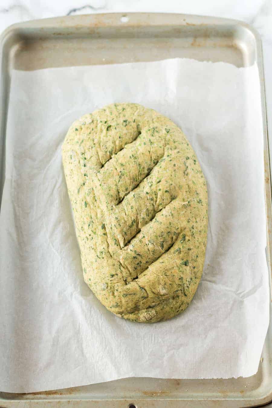 Rustic whole wheat spinach bread made with fresh or frozen spinach for a healthy and colorful bread you'll love to make and eat.