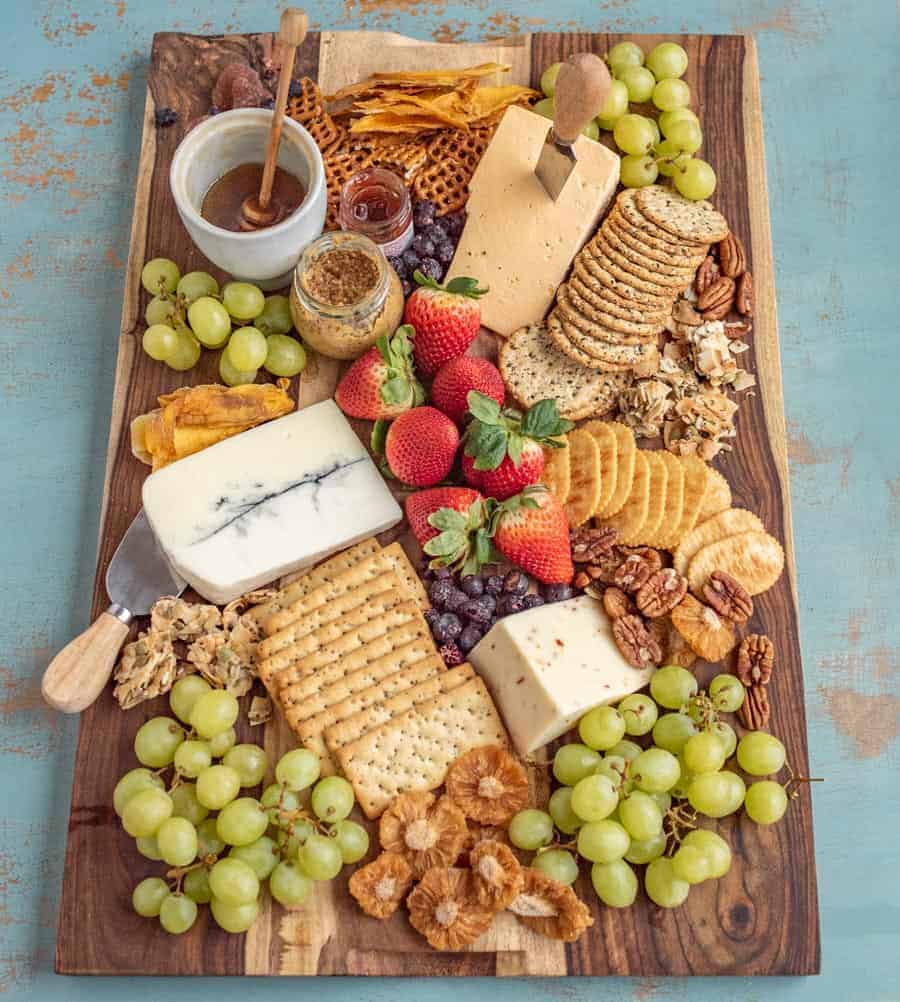 This classic cheese board has a little something for everyone! I like to fill my cheese boards with sweet, savory, and salty elements to round out the flavors and textures.