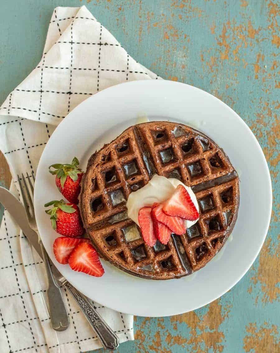 Has there ever been a better word combination than CHOCOLATE WAFFLES? I think not. This fluffy, rich chocolate waffle recipe may seem like a dessert, but they aren't overly sweet--making them the perfect unexpected breakfast item.