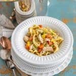 This comforting Chunky Chicken Noodle Soup will brighten any gloomy day and combat any head cold with its hearty combination of shredded chicken (or turkey), egg noodles, carrots, peas, corn, and lots of flavor-packing spices.