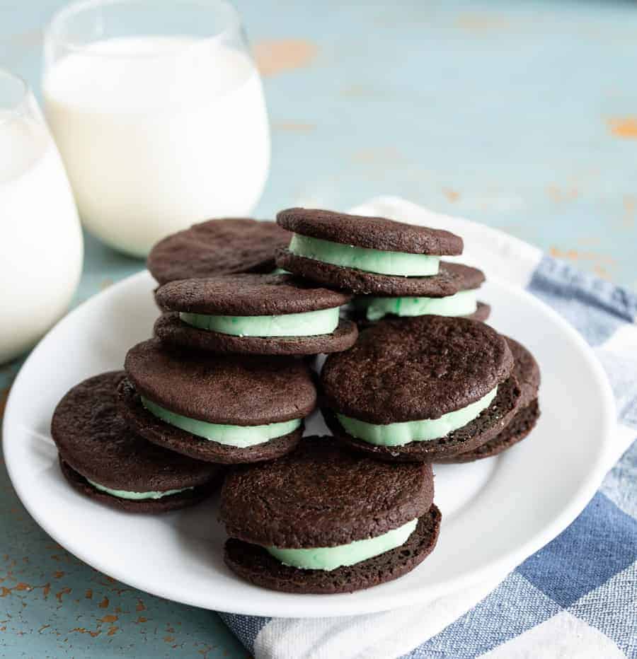 Homemade Mint Oreo cookies made with dark cocoa powder are crispy on the outside, with a perfect mint cream filling in the middle.