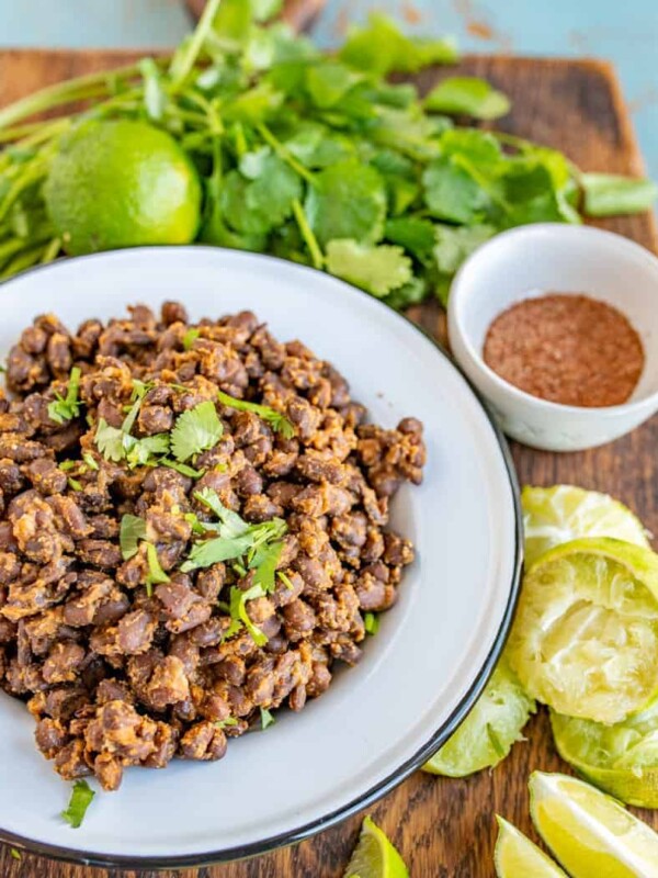Quick and easy Mexican Black Beans for Tacos and for a side to all your favorite Tex-Mex dishes, made with canned black beans and lots of vibrant seasonings.
