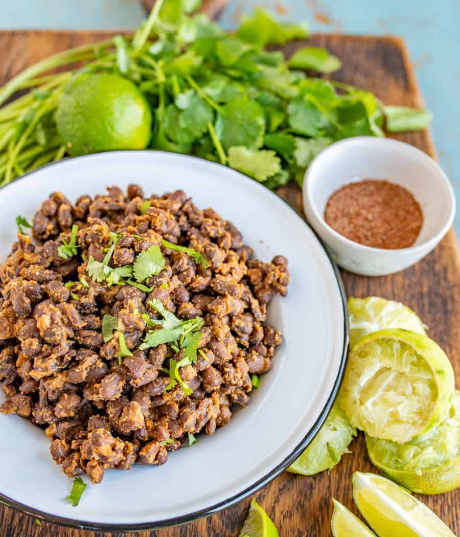 Quick and easy Mexican Black Beans for Tacos and for a side to all your favorite Tex-Mex dishes, made with canned black beans and lots of vibrant seasonings.