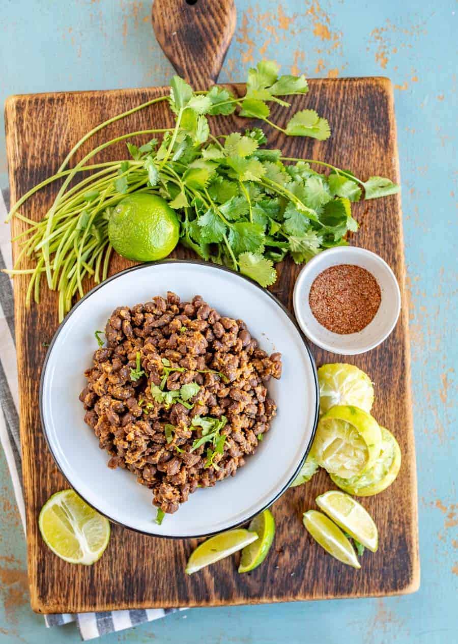 Quick and easy Mexican Black Beans for Tacos and for a side to all your favorite Tex-Mex dishes, made with canned black beans and lots of vibrant seasonings.