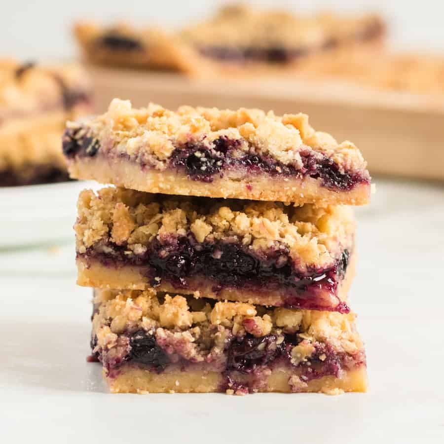 a stack of three blueberry pie bars