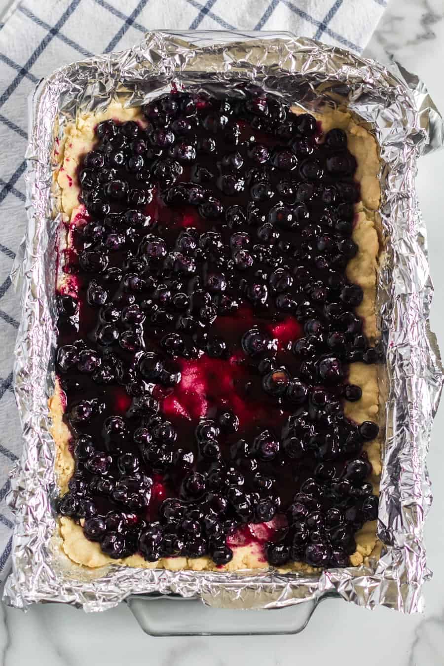 These streusel-topped Blueberry Pie Bars have a dense crust and gooey, blueberry-packed filling to make them a perfect dessert (or breakfast) any day.