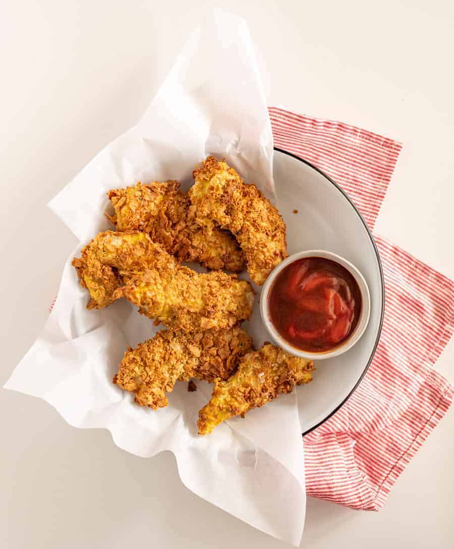 This step-by-step guide for how to make homemade chicken strips in the air fryer yields perfectly crunchy and crispy chicken strips, without the mess and mayhem of traditional frying methods!