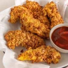 This step-by-step guide for how to make homemade chicken strips in the air fryer yields perfectly crunchy and crispy chicken strips, without the mess and mayhem of traditional frying methods!