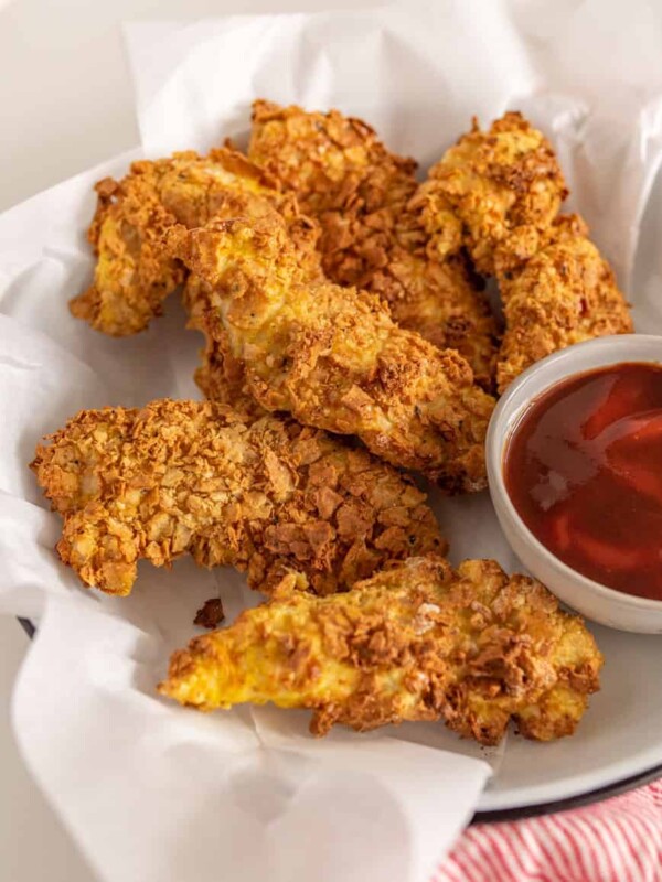 This step-by-step guide for how to make homemade chicken strips in the air fryer yields perfectly crunchy and crispy chicken strips, without the mess and mayhem of traditional frying methods!