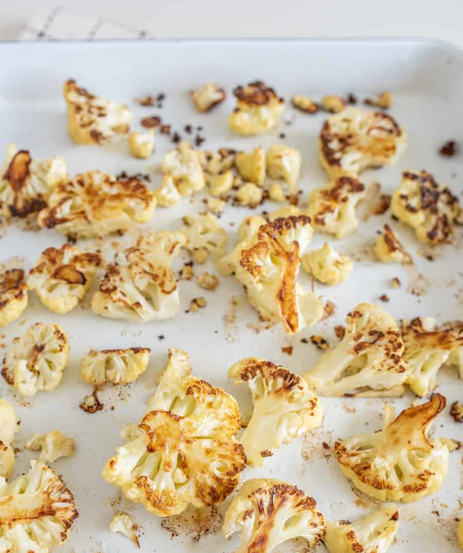 Easy Roasted Cauliflower only requires three basic ingredients and comes together to make a crunchy, decadent side to any meal.