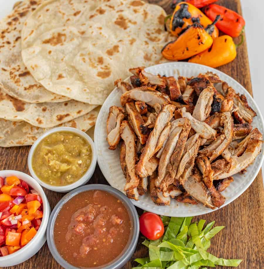 Perfectly seasoned with lime juice, garlic, cumin, chili powder, and smoked paprika, these crave-able Grilled Chicken Tacos are the most satisfying and simple meat you'll ever grill.
