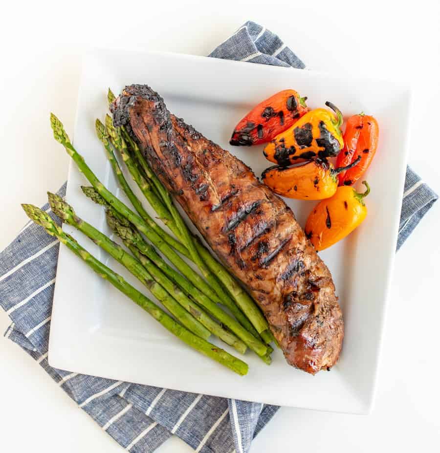 Brown Sugar and Garlic Grilled Pork Tenderloin is robust and smoky with a nice sweet-to-savory ratio. Fire up the grill because this is your new go-to summertime barbecue meat.