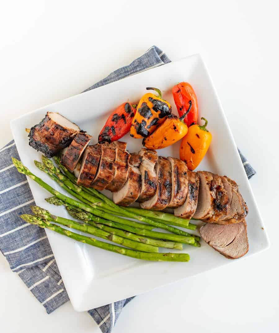 Brown Sugar and Garlic Grilled Pork Tenderloin is robust and smoky with a nice sweet-to-savory ratio. Fire up the grill because this is your new go-to summertime barbecue meat.