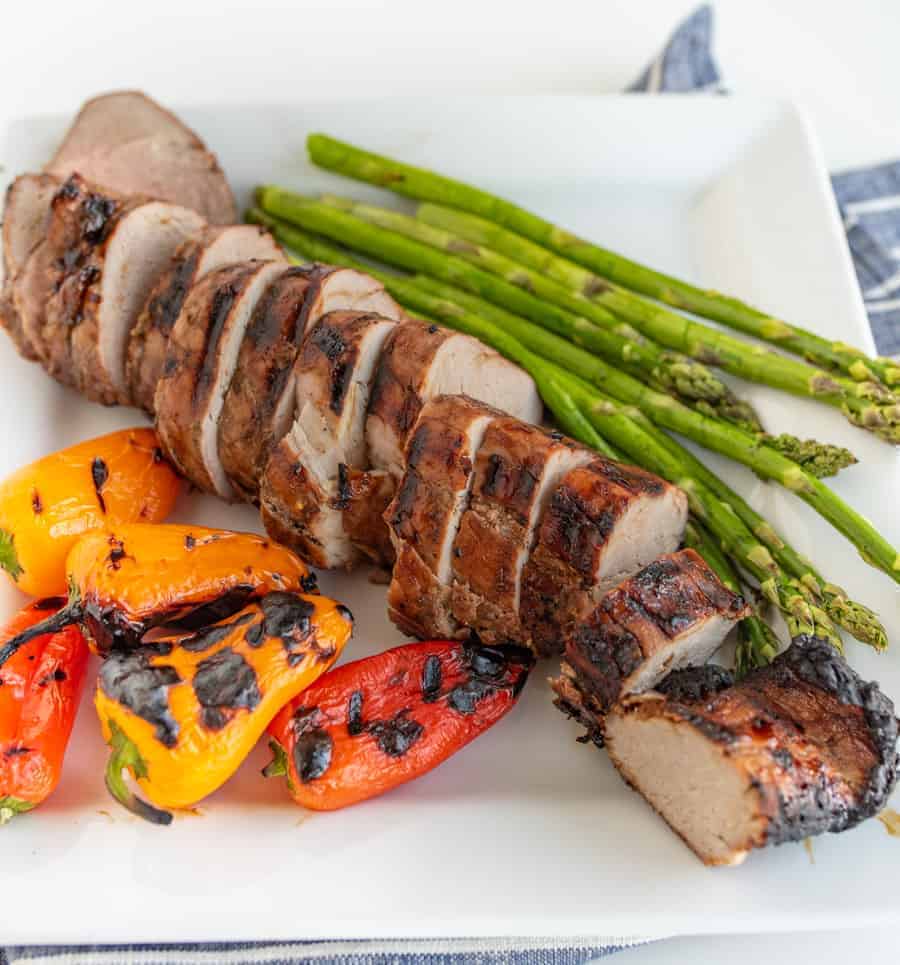 Brown Sugar and Garlic Grilled Pork Tenderloin is robust and smoky with a nice sweet-to-savory ratio. Fire up the grill because this is your new go-to summertime barbecue meat.