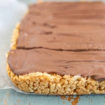 No-bake Scotcheroos combine the delightful flavors of butterscotch, chocolate, and peanut butter with the perfect amount of crunch from crispy rice cereal.