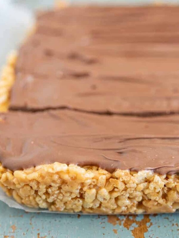 No-bake Scotcheroos combine the delightful flavors of butterscotch, chocolate, and peanut butter with the perfect amount of crunch from crispy rice cereal.