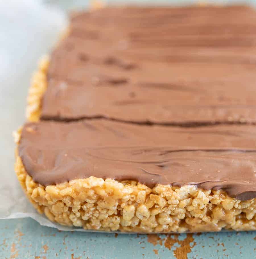 No-bake Scotcheroos combine the delightful flavors of butterscotch, chocolate, and peanut butter with the perfect amount of crunch from crispy rice cereal.