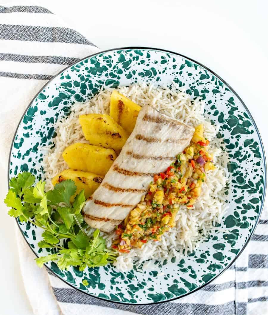 Light and citrusy Grilled Mahi Mahi with Pineapple Salsa is a simple summer meal that has unbelievable flavor and looks beautiful, too!