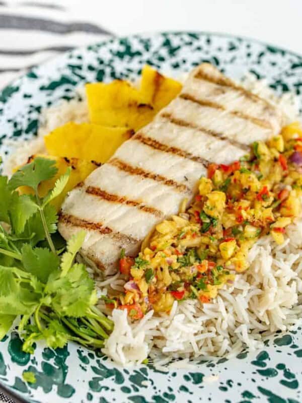 Light and citrusy Grilled Mahi Mahi with Pineapple Salsa is a simple summer meal that has unbelievable flavor and looks beautiful, too!