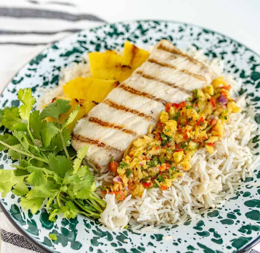 Light and citrusy Grilled Mahi Mahi with Pineapple Salsa is a simple summer meal that has unbelievable flavor and looks beautiful, too!