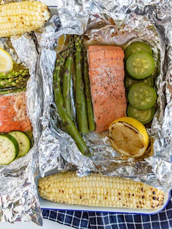 A fresh and fast meal, Grilled Salmon Foil Packs with Veggies couldn't be easier to toss together and grill up quickly with the simple flavorings of some lemon, butter, salt, and pepper.