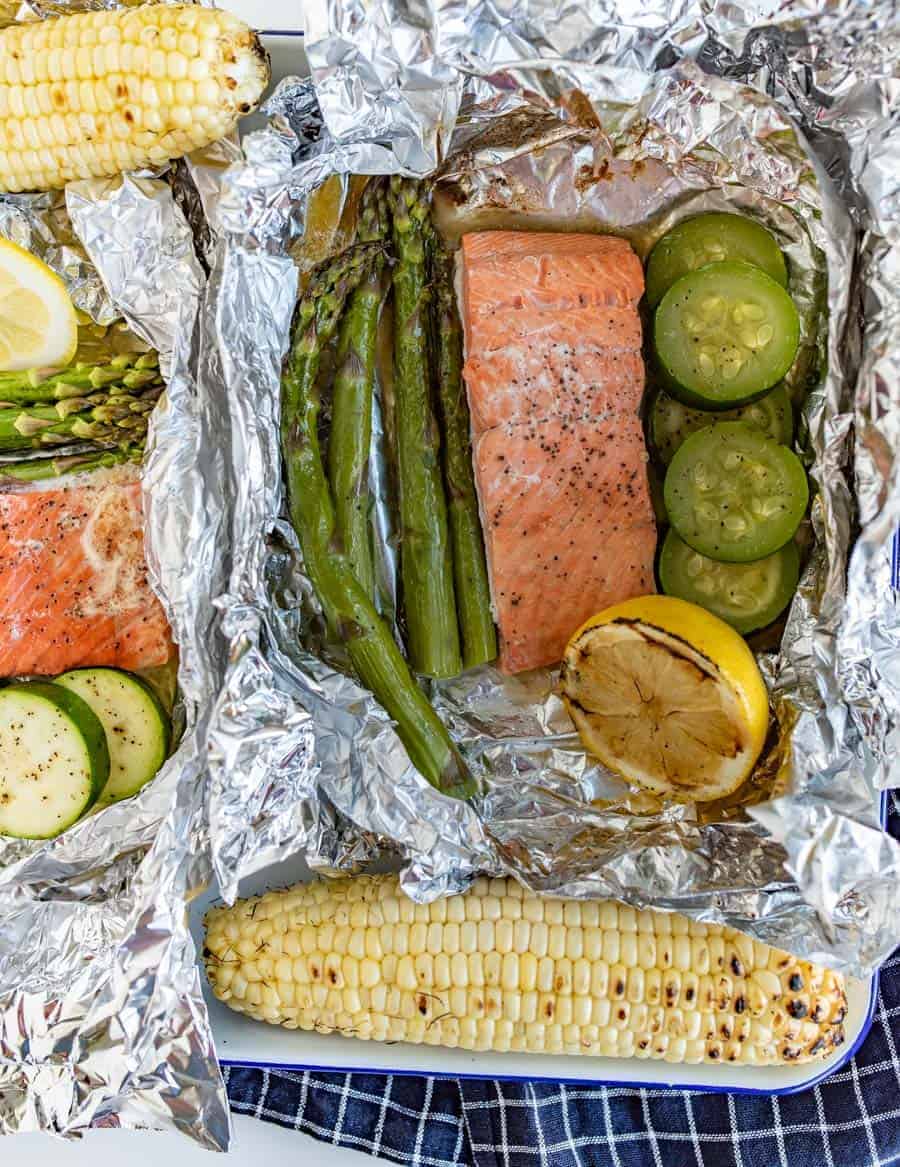 A fresh and fast meal, Grilled Salmon Foil Packs with Veggies couldn't be easier to toss together and grill up quickly with the simple flavorings of some lemon, butter, salt, and pepper.