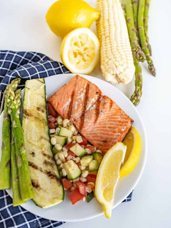 This Easy Grilled Salmon Recipe is perfect for grill novices to learn how to grill salmon. It's flakey, lemony, and salty in all the best ways, and comes together with little time or effort!