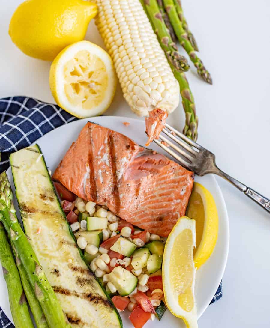 This Easy Grilled Salmon Recipe is perfect for grill novices to learn how to grill salmon. It's flakey, lemony, and salty in all the best ways, and comes together with little time or effort!