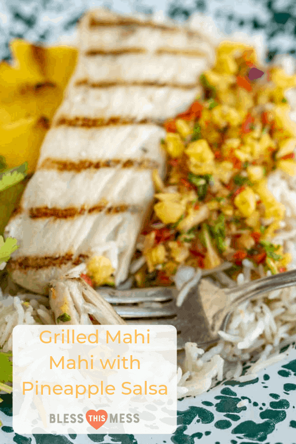 Light and citrusy Grilled Mahi Mahi with Pineapple Salsa is a simple summer meal that has unbelievable flavor and looks beautiful, too!