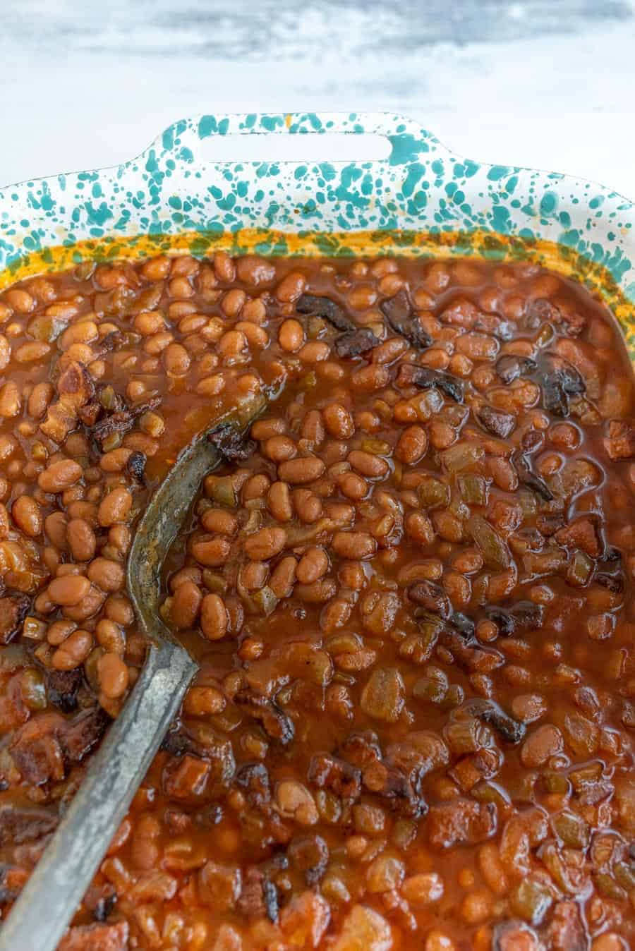 Smoky and savory with just a hint of sweetness, Grandma Lucy's baked beans recipe is famous around my household, and I know it'll be a staple in yours, too.