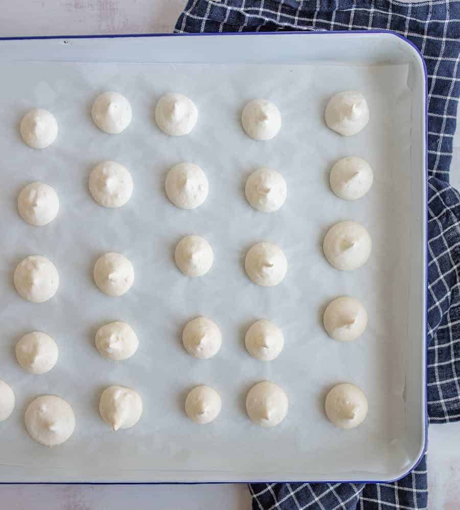 Light, sweet, and crunchy, easy meringue cookies are cute little bites of dessert that are as fun to eat as they are to make.