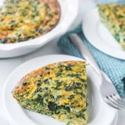 crustless spinach quiche on a white plate