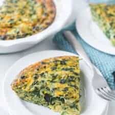 crustless spinach quiche on a white plate
