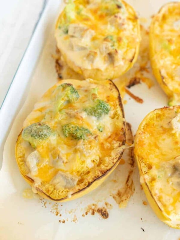 cheesy chicken in a baked spaghetti squash half