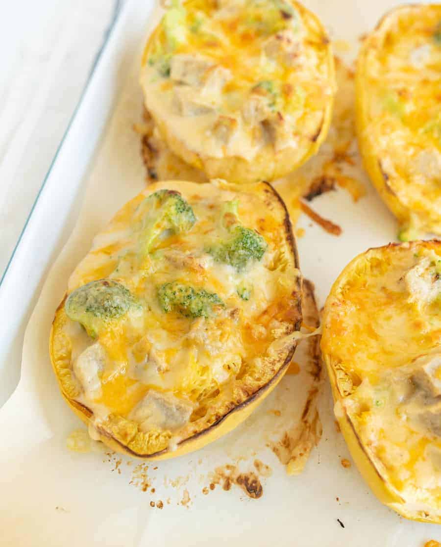 Rich and gooey, this cheesy chicken and broccoli stuffed spaghetti squash is low carb and packed full of flavor and filling nutrients! #spaghettisquash #chicken #cheese #broccoli #healthydinners #easydinners