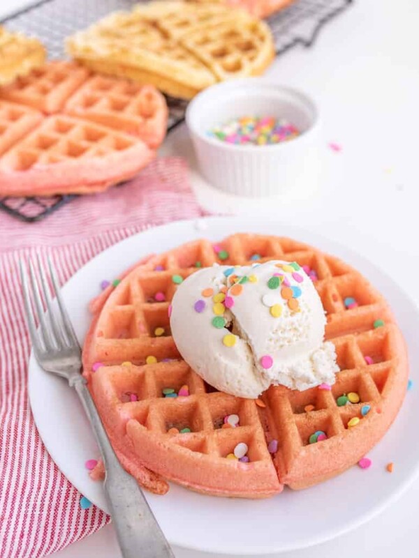 cake batter waffles with sprinkles and whipped cream